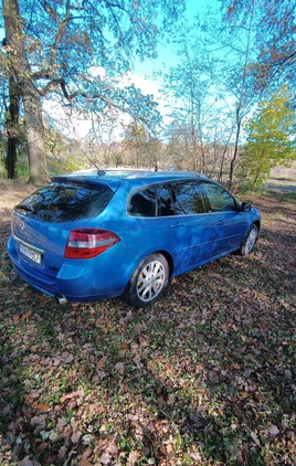 Renault Laguna cena 11500 przebieg: 350000, rok produkcji 2009 z Brzostek małe 67